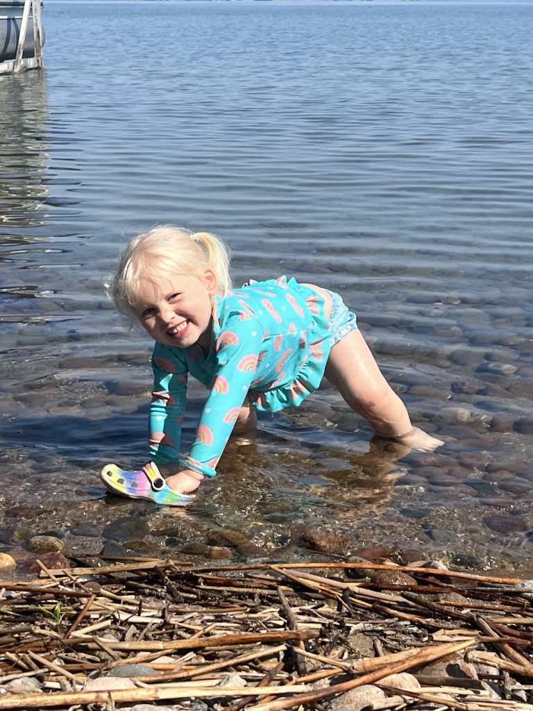 Synneva playing with her crocs in Battle Lake